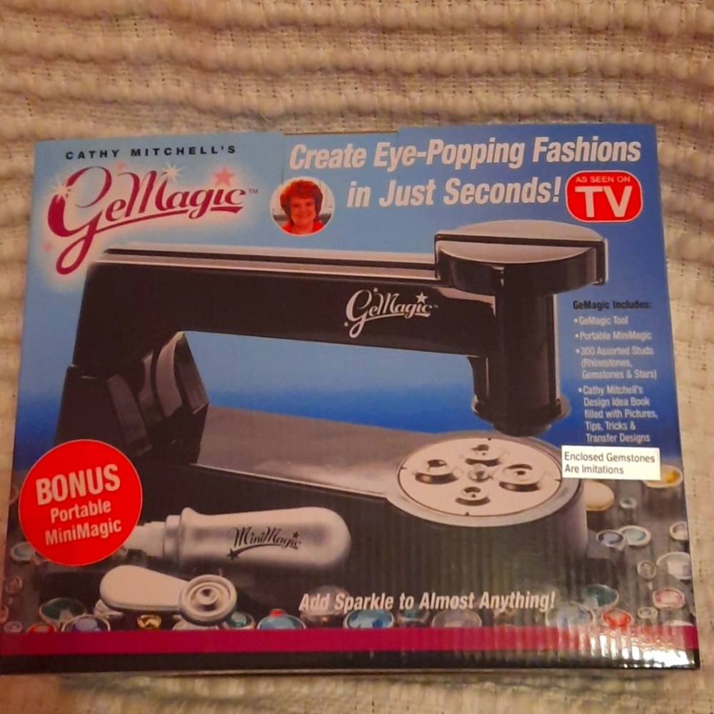 Two boxes of Cathy Mitchell's GeMagic kit. Add sparkle to almost anything.